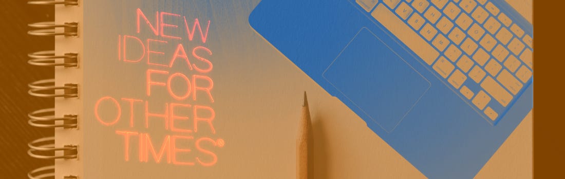 "New ideas for other times" with laptop, sketchbook, and pencil in orange negative filter